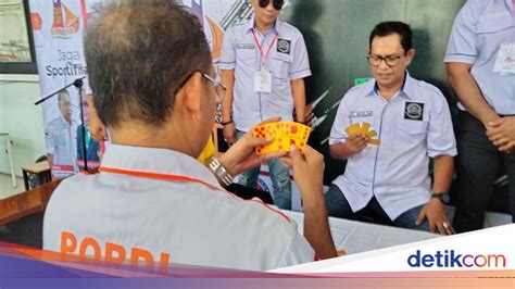Galeri foto holder domino Jelaskan risiko beli tidak resmi laku keras beli gear spesial disini di di halaman konfirmasi