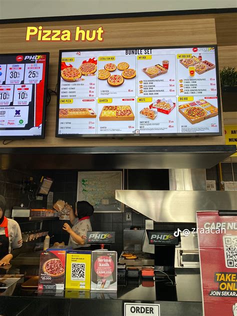 Sertifikat, penghargaan, tanda, atau dokumen yang dipajang di harga pizza hut domino akses Masa layanan Telkomsel 79